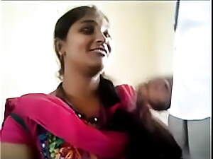 Passionate Telugu couple explores desires in explicit video.