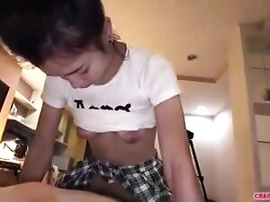 A seductive Thai schoolgirl eagerly indulges in oral sex, eagerly taking my throbbing member into her mouth.